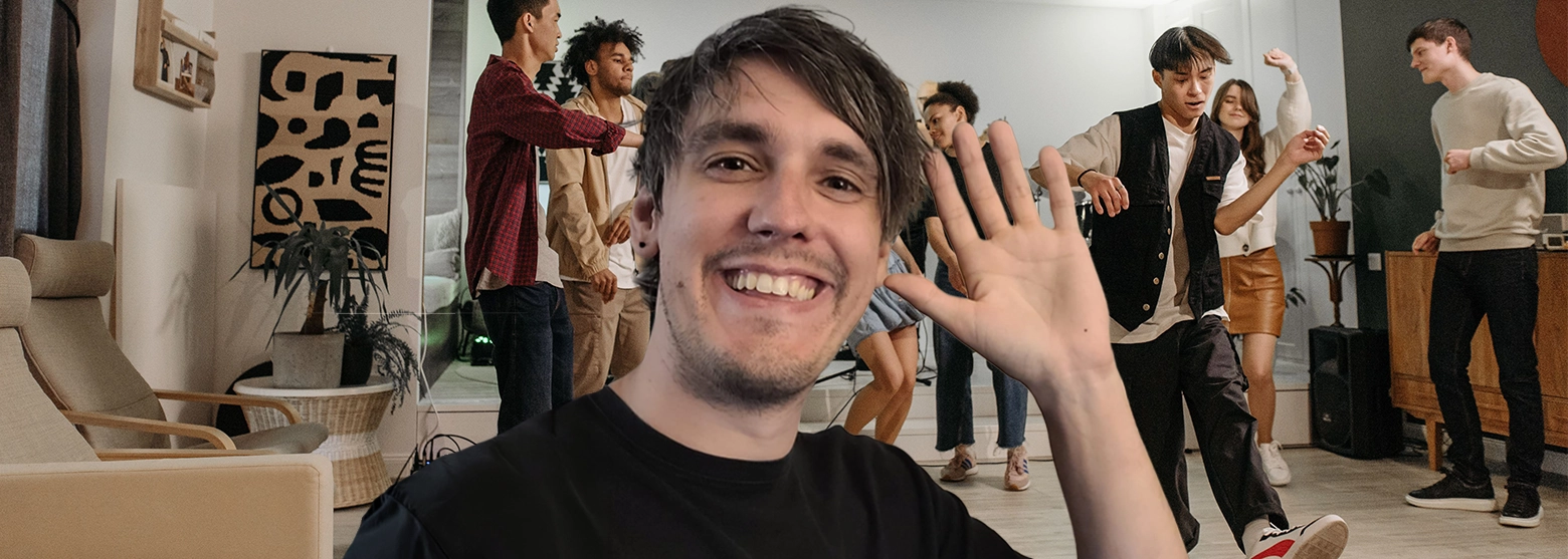 Josh Ackermann, marketing specialist, waves at a party to show an approachable Instagram face.